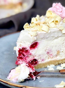 slice of raspberry white chocolate ice cream cheesecake