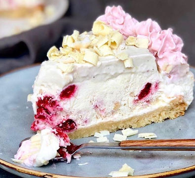 slice of raspberry white chocolate ice cream cheesecake