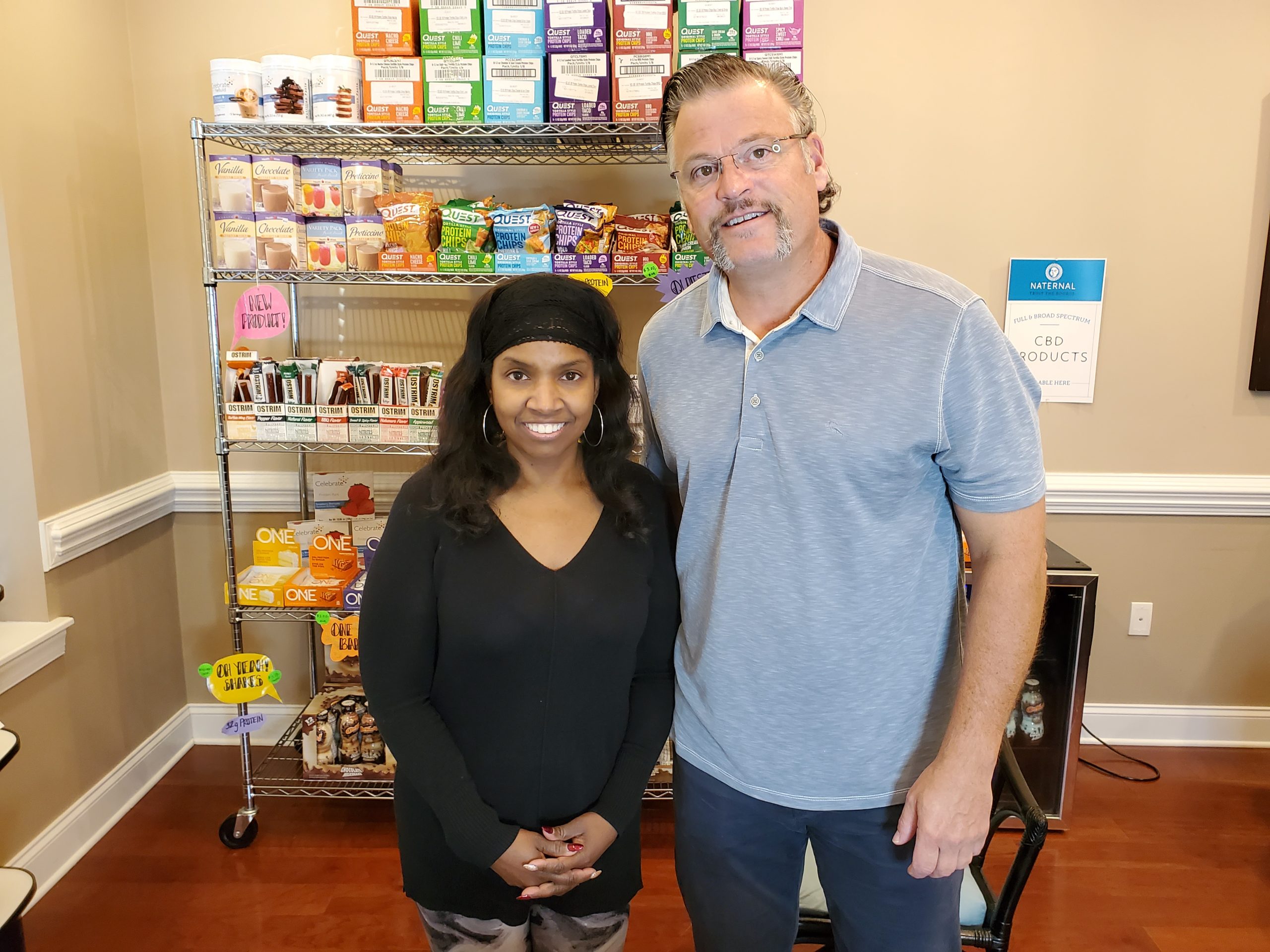 Dr. Simonds standing with Lovie Watson at Dr. Simonds Metabolics and Weight Loss office in Raleigh, NC