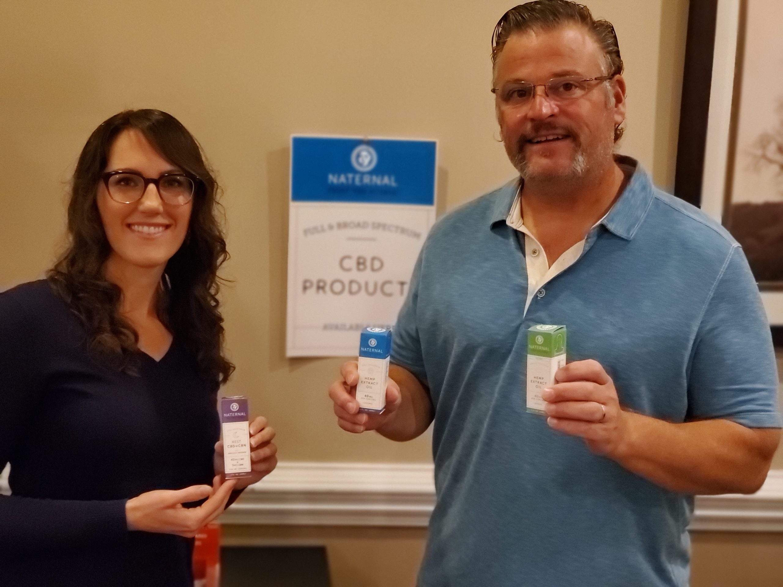 Dr. Simonds and Michelle Kennedy, NP-C holding CBD products