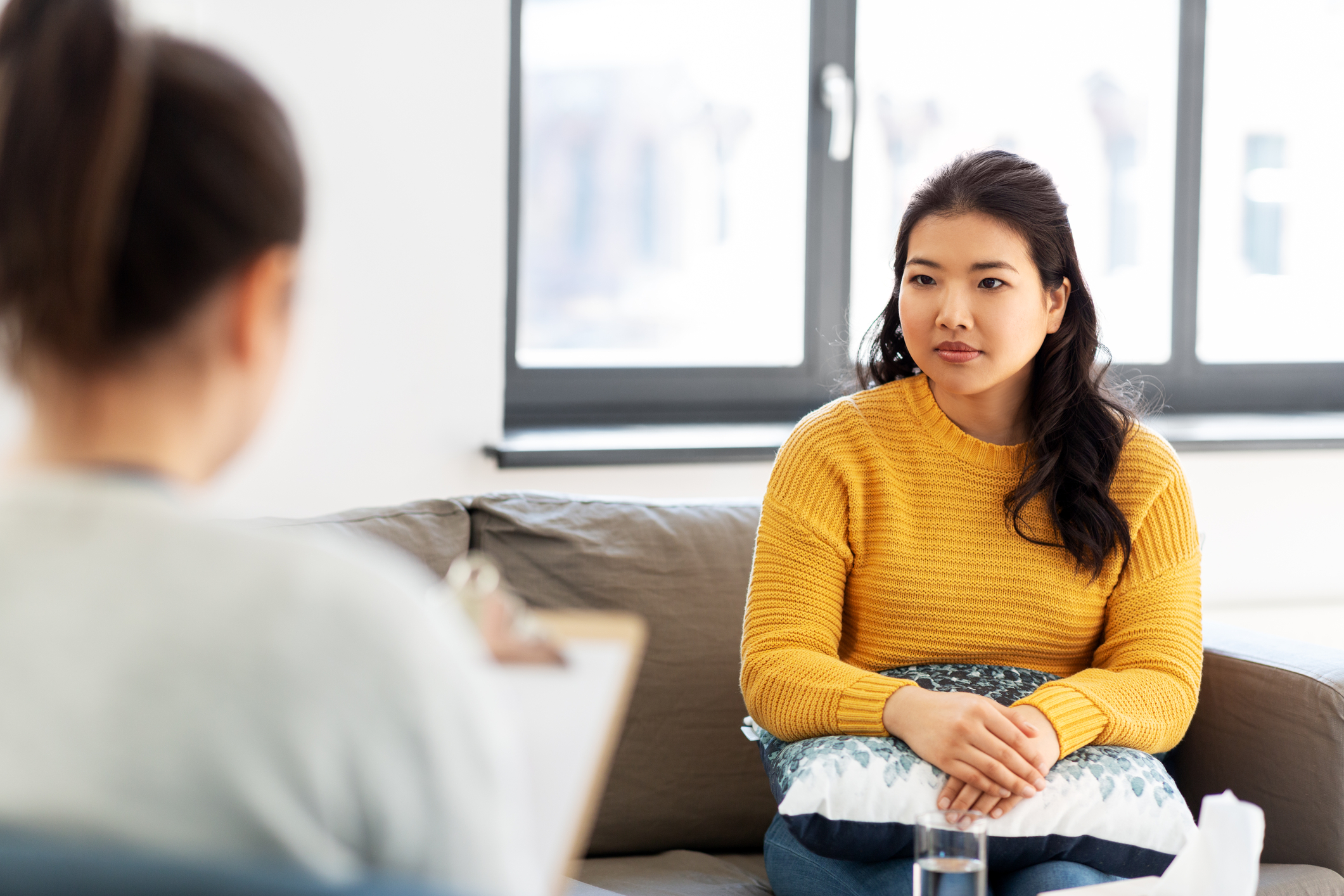 Young asian woman patient and psychologist