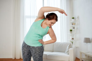 Woman Stretching At Home