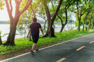 man walking in park